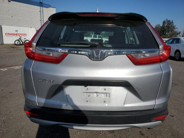 2HKRW5H31KH414489 - 2019 HONDA CR-V LX SILVER photo 6