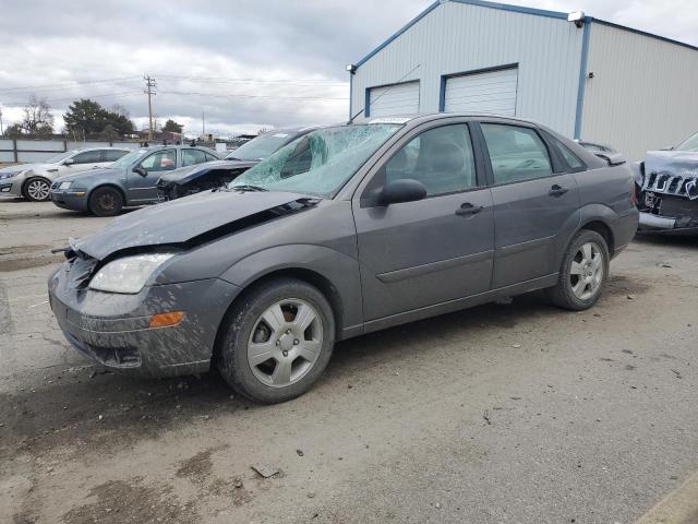 1FAFP34N25W148612 - 2005 FORD FOCUS ZX4 GRAY photo 1