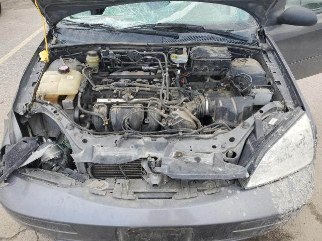 1FAFP34N25W148612 - 2005 FORD FOCUS ZX4 GRAY photo 11