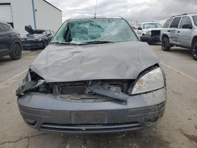 1FAFP34N25W148612 - 2005 FORD FOCUS ZX4 GRAY photo 5