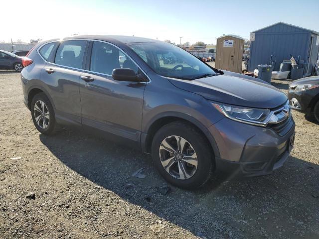 2HKRW5H35JH416664 - 2018 HONDA CR-V LX GRAY photo 4