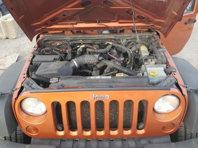 1J4AA2D17BL549433 - 2011 JEEP WRANGLER SPORT ORANGE photo 11