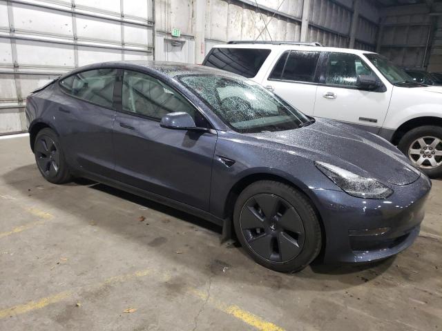5YJ3E1EAXPF558830 - 2023 TESLA MODEL 3 Серый фото 4