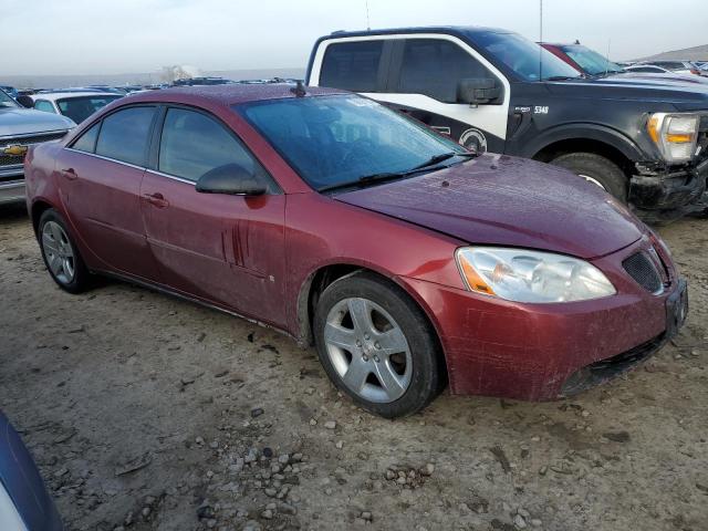 1G2ZG57B394214255 - 2009 PONTIAC G6 RED photo 4