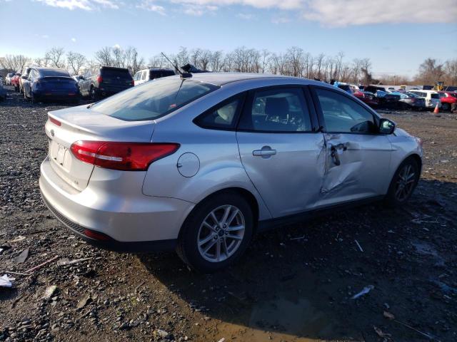 1FADP3F29HL240428 - 2017 FORD FOCUS SE SILVER photo 3