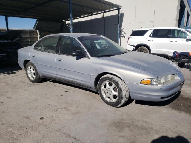 1G3WH52K7WF325636 - 1998 OLDSMOBILE INTRIGUE GRAY photo 4