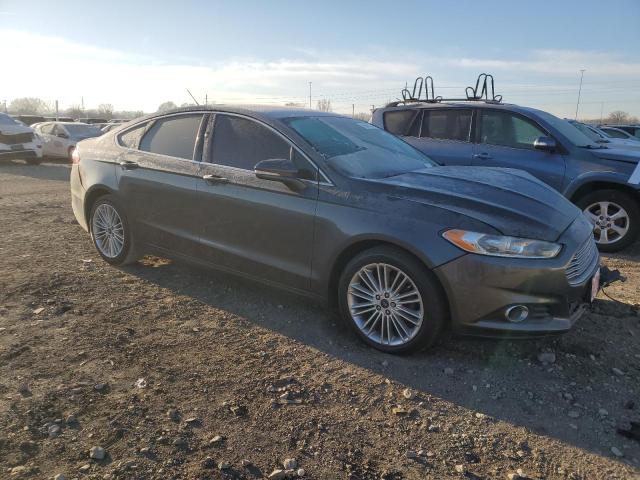 3FA6P0T94FR192523 - 2015 FORD FUSION SE GRAY photo 4