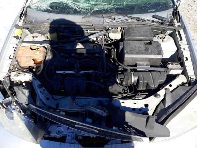 1FAFP34N15W230735 - 2005 FORD FOCUS ZX4 SILVER photo 11