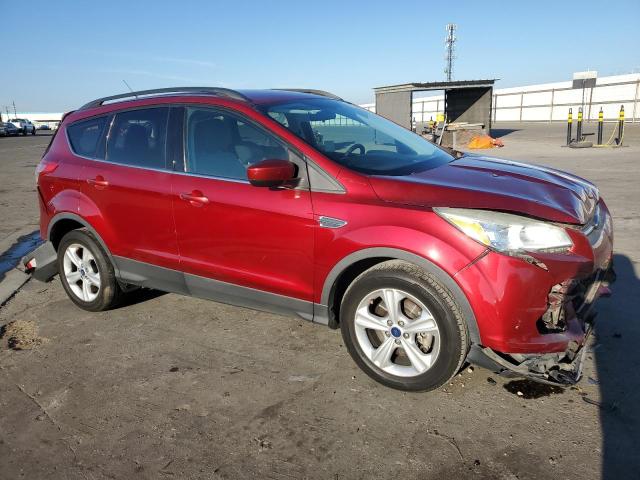 1FMCU0G90FUA25919 - 2015 FORD ESCAPE SE RED photo 4