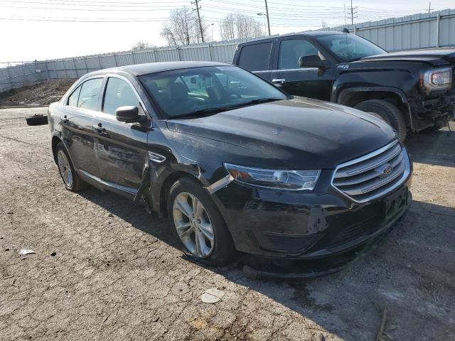 1FAHP2D86HG135163 - 2017 FORD TAURUS SE BLACK photo 4