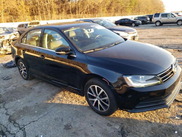 3VWDB7AJ0HM337396 - 2017 VOLKSWAGEN JETTA SE BLACK photo 4