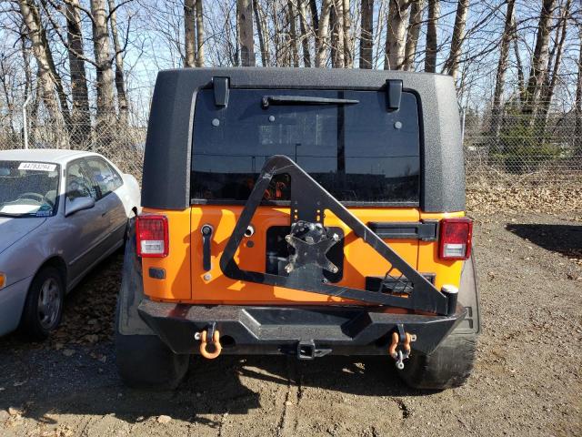 1C4BJWDG4DL563637 - 2013 JEEP WRANGLER U SPORT ORANGE photo 6