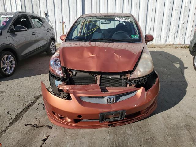 JHMGD38697S003554 - 2007 HONDA FIT S ORANGE photo 5