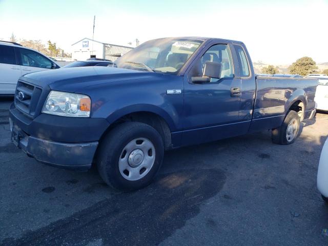 1FTVF12505NB27344 - 2005 FORD F150 BLUE photo 1