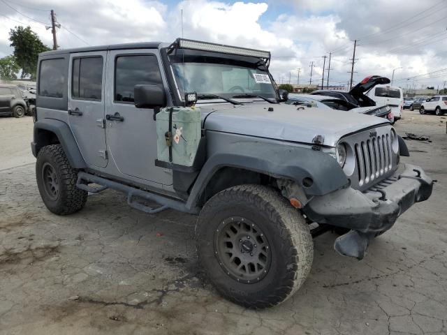 1C4BJWDG1FL722276 - 2015 JEEP WRANGLER U SPORT SILVER photo 4