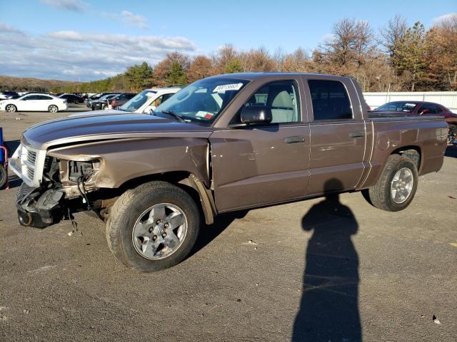 1D7RW3GK0AS155223 - 2010 DODGE DAKOTA SXT TAN photo 1