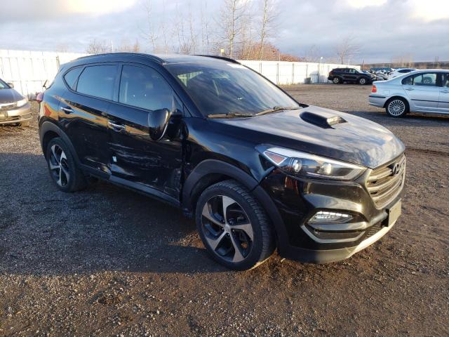 KM8J3CA28JU824279 - 2018 HYUNDAI TUCSON VALUE BLACK photo 4