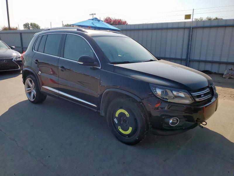 WVGAV7AX7FW601594 - 2015 VOLKSWAGEN TIGUAN S BLACK photo 4