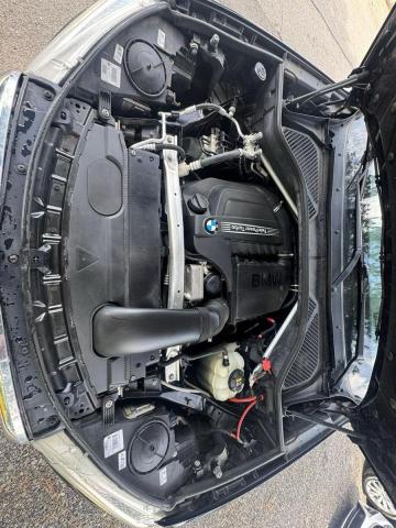 5UXKU2C50J0Z61424 - 2018 BMW X6 XDRIVE35I შავი ფოტო 7