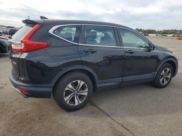 2HKRW6H31JH217357 - 2018 HONDA CR-V LX Schwarz Foto 3