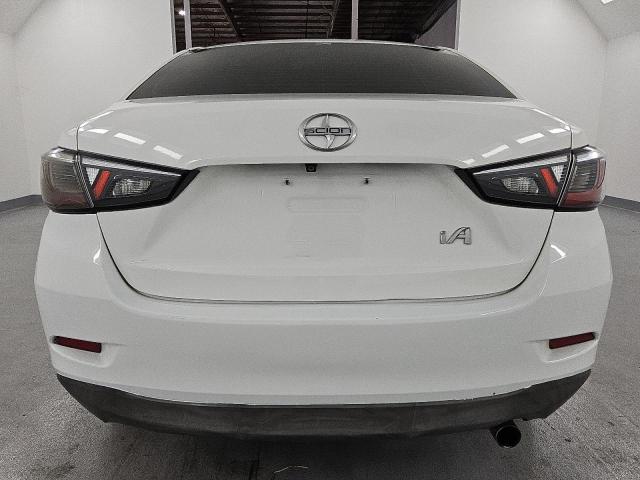 3MYDLBZV8GY111125 - 2016 TOYOTA SCION IA WHITE photo 6