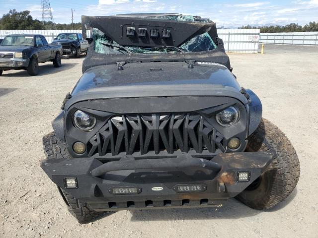 1C4BJWDG7GL311238 - 2016 JEEP WRANGLER U SPORT Qara foto 5