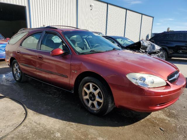 1FAFP582XYG136413 - 2000 FORD TAURUS WAG SE RED photo 4