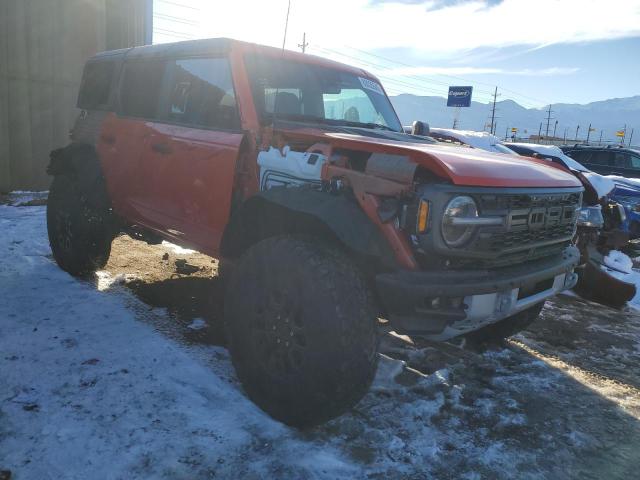 1FMEE5JR4PLB12158 - 2023 FORD BRONCO RAPTOR ORANGE photo 4