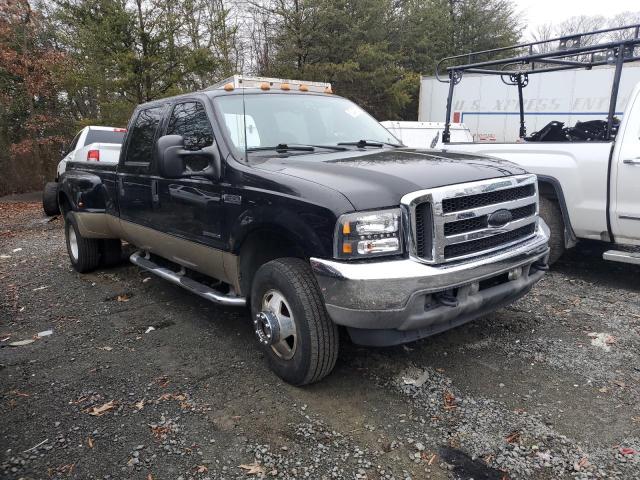 1FTWW33FX1ED81127 - 2001 FORD F350 SUPER DUTY BLACK photo 4