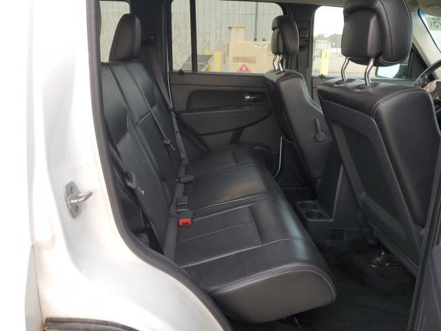 1C4PJMAK2CW196334 - 2012 JEEP LIBERTY SPORT WHITE photo 11