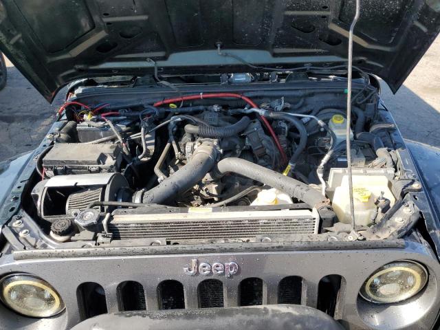 1J4BA5H1XAL125839 - 2010 JEEP WRANGLER U SAHARA Yaşıl foto 12