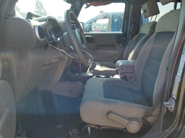 1J4BA5H1XAL125839 - 2010 JEEP WRANGLER U SAHARA Yaşıl foto 7