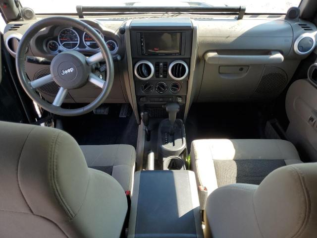 1J4BA5H1XAL125839 - 2010 JEEP WRANGLER U SAHARA Yaşıl foto 8