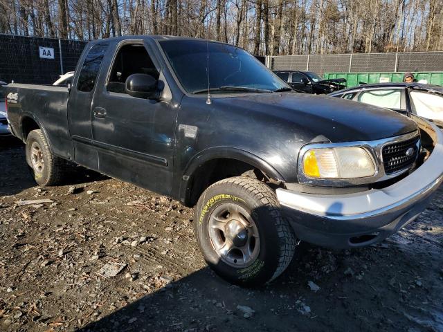 1FTRX18L2XNB88511 - 1999 FORD F150 BLACK photo 4