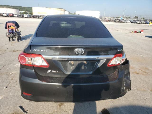 5YFBU4EE6DP090985 - 2013 TOYOTA COROLLA BASE Schwarz Foto 6