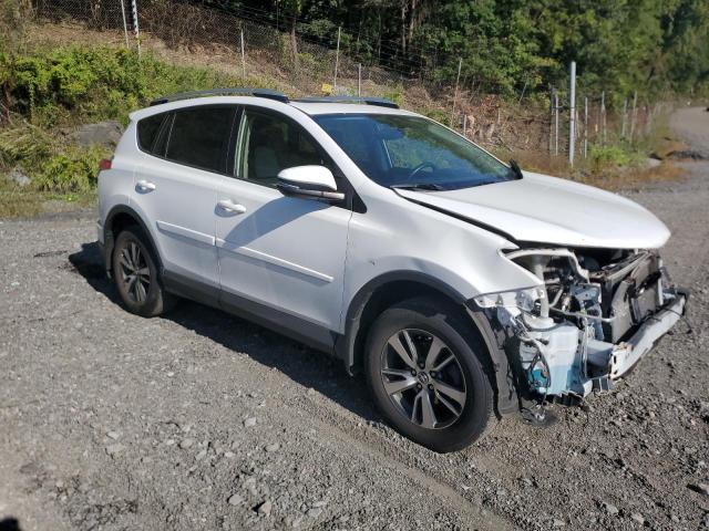 JTMRFREV8GJ057629 - 2016 TOYOTA RAV4 XLE WHITE photo 4
