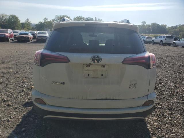 JTMRFREV8GJ057629 - 2016 TOYOTA RAV4 XLE WHITE photo 6