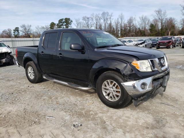 1N6AD0ER1AC449023 - 2010 NISSAN FRONTIER CREW CAB SE BLACK photo 4