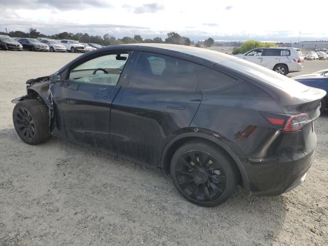7SAYGDED3RF049437 - 2024 TESLA MODEL Y BLACK photo 2