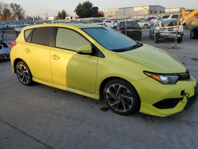 JTNKARJE7HJ526096 - 2017 TOYOTA COROLLA IM YELLOW photo 4