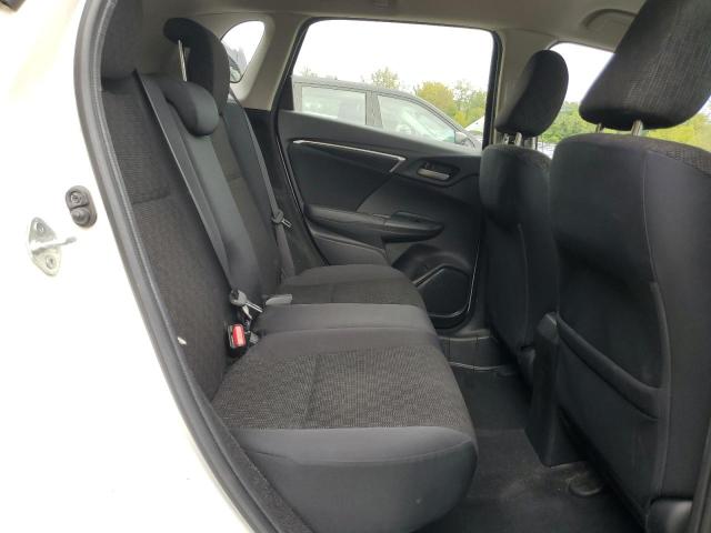 JHMGK5H55GS011515 - 2016 HONDA FIT LX WHITE photo 10
