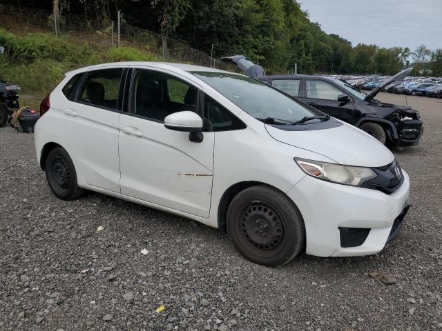 JHMGK5H55GS011515 - 2016 HONDA FIT LX WHITE photo 4