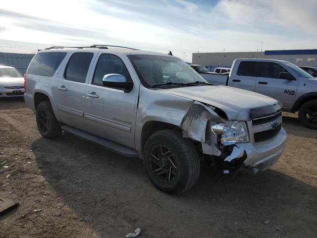 1GNUKJE34AR249572 - 2010 CHEVROLET SUBURBAN K1500 LT SILVER photo 4