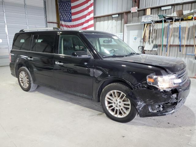 2FMGK5C89KBA17318 - 2019 FORD FLEX SEL Schwarz Foto 4