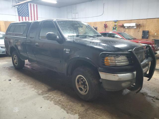 1FTRX18L53NA27676 - 2003 FORD F150 BLACK photo 4