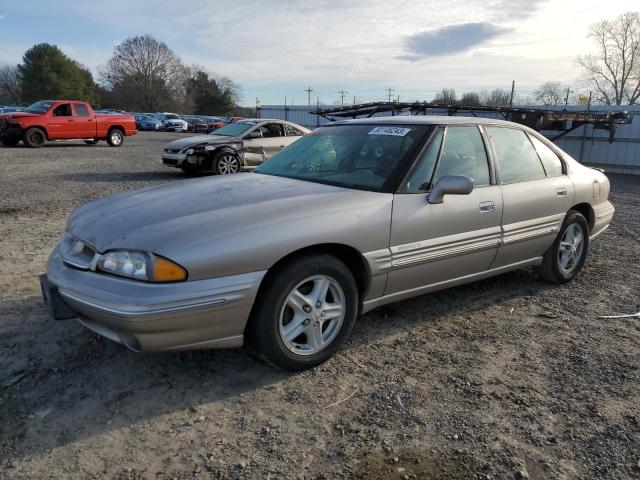 1G2HX52K5W4218581 - 1998 PONTIAC BONNEVILLE SE TAN photo 1