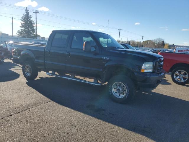 1FTNW21L23EB82655 - 2003 FORD F250 SUPER DUTY BLACK photo 4