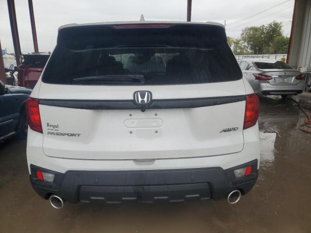5FNYF8H54PB029528 - 2023 HONDA PASSPORT EXL WHITE photo 6