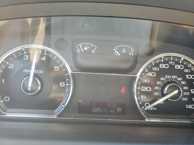 1LNHM93R59G633860 - 2009 LINCOLN MKS Blau Foto 9