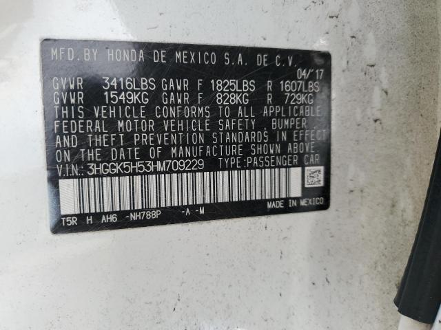 3HGGK5H53HM709229 - 2017 HONDA FIT LX WHITE photo 12